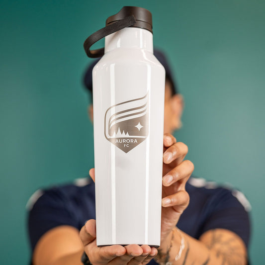 White water bottle with a black top featuring the Aurora crest in silver