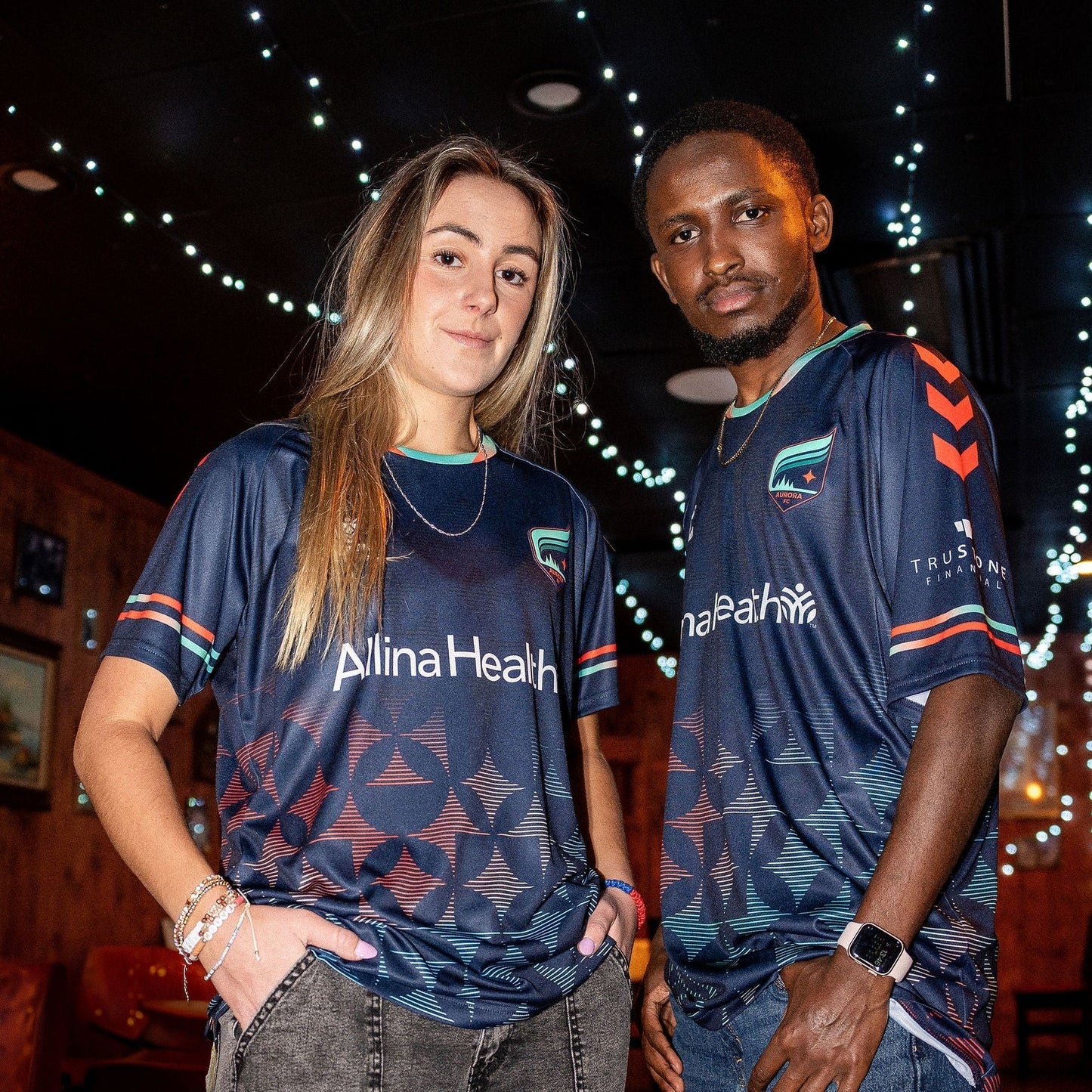 Navy soccer jersey with orange and blue gradient star pattern