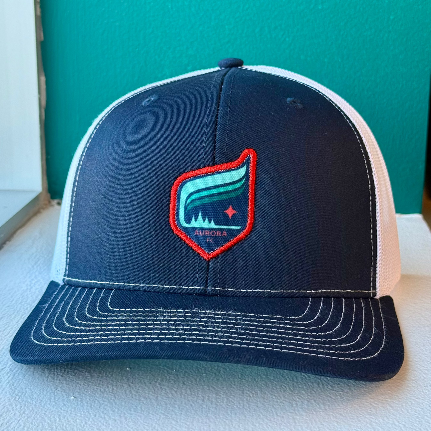 Aurora Crest Navy/White Trucker Hat