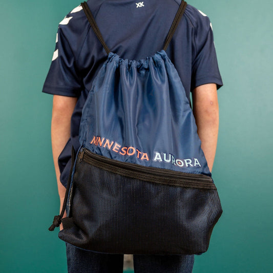 Navy blue bag with black drawstrings and zipper featuring a mesh front pocket