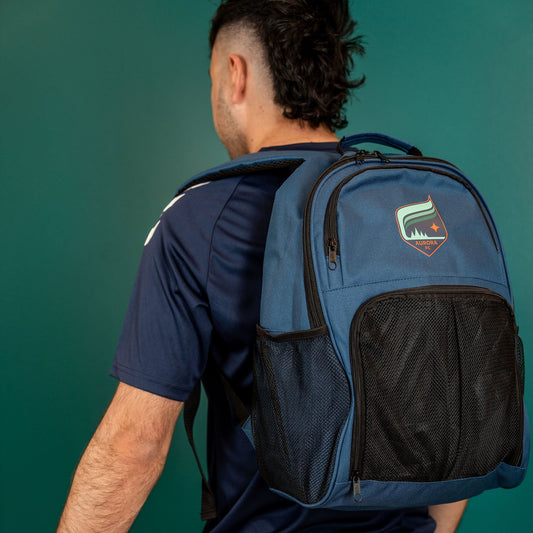 Blue backpack with black accents featuring the Aurora crest
