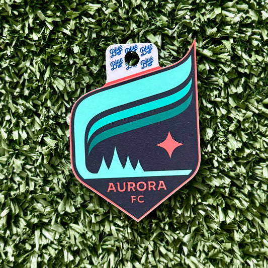 Aurora FC Sticker  on a green textured background